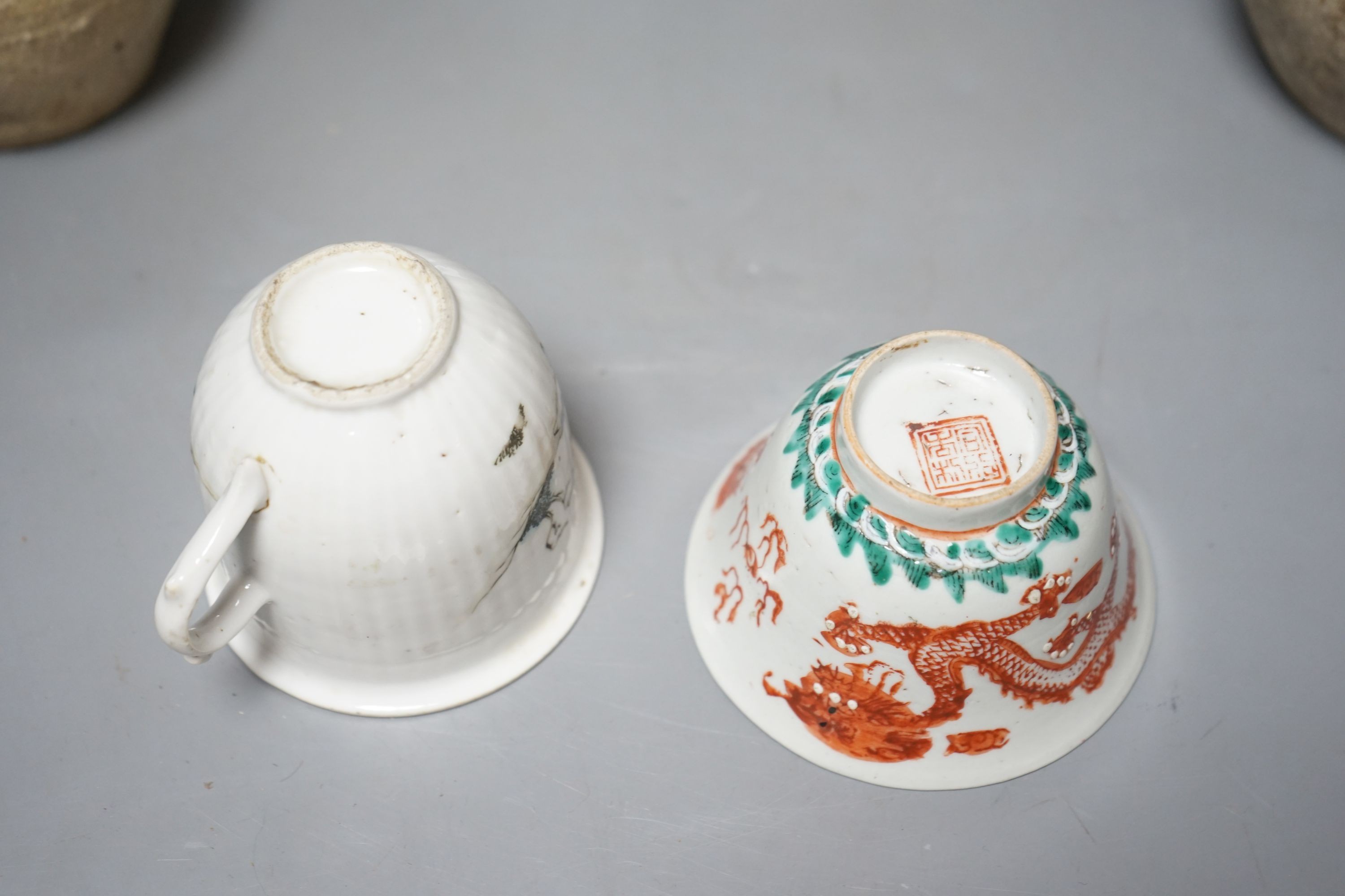 A Chinese blue and white vase, Xuande mark, c.1900, two late 19th Century Chinese cups and four Chinese provincial earthenware jars 19cm